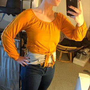 Mustard yellow tie-top with lace inserts